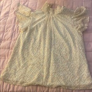 Cream Blouse with Sheer Fabric and Ruffled Neckline